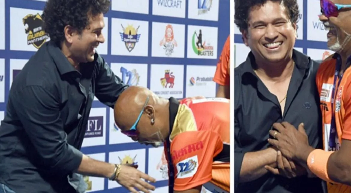 kambli touches sachin feet!!!